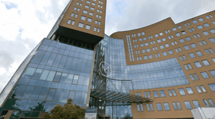 Innovative corporate office building with glass façade and modern architecture, representing Keylane’s dynamic work environment and career opportunities in the technology and insurance sectors.