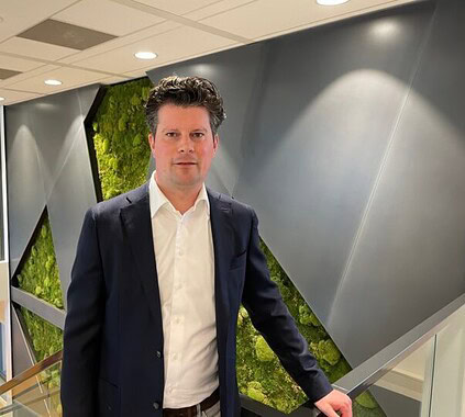 Innovative business professional at Keylane corporate office, highlighting careers in fintech and insurance technology.